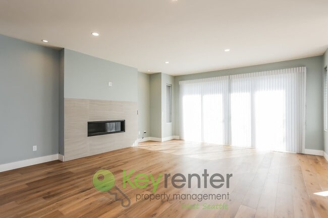 Building Photo - Spacious Living with Balconies, Deck, and Private Yard