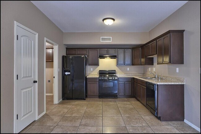 Building Photo - 14302 Pancho Gonzalez Ct