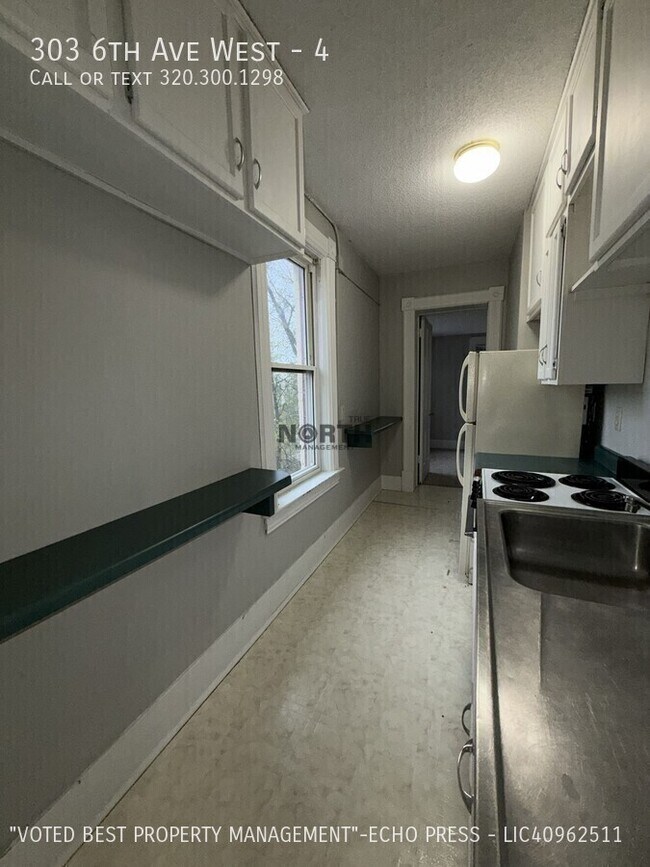 Building Photo - 303 6th Ave W