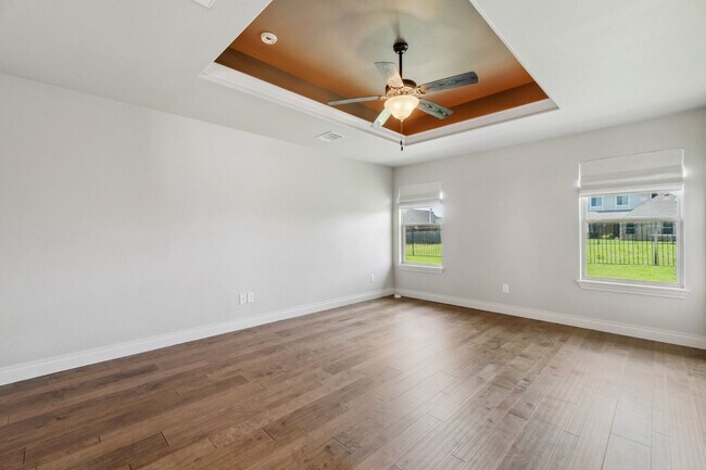 Building Photo - Upscale Comfort Meets Everyday Functionality in This Stunning 3-Car Garage Home!