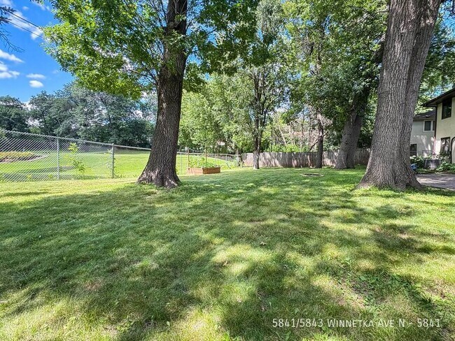 Building Photo - 5841/5843 Winnetka Ave N-5841