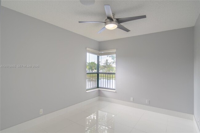 Building Photo - 3745 Cocoplum Cir