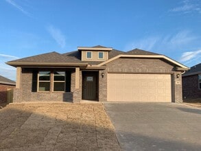 Building Photo - New Beginnings Start At AMRR: 4 bedroom / 2 bath in Apple Crossing!