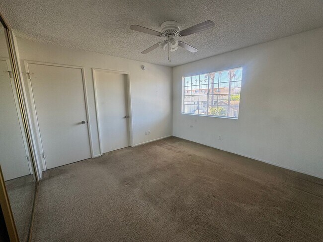 Building Photo - $2,395! Spacious Upstairs 2 Bedroom, 2 Bathroom Apartment with 2-Car Garage! 90710