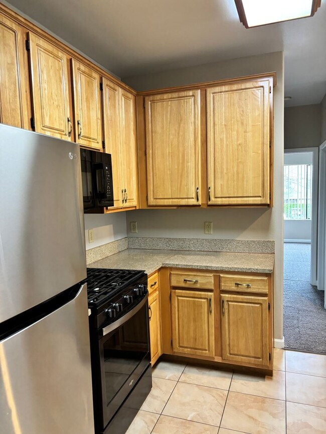 Building Photo - $2,000 PER MONTH FOR THIS GORGEOUS CONDO - AVAILABLE IMMEDIATELY- 2 BEDROOM, 2 BATH UPSTAIRS UNIT...