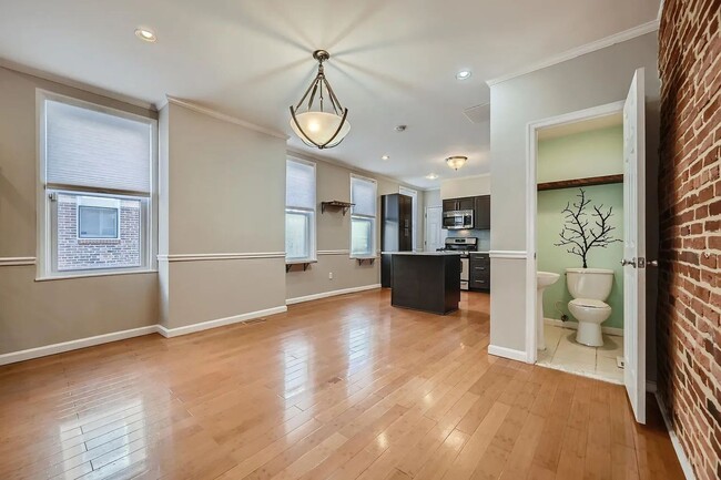 Building Photo - Charming 3 Bedroom/2.5 Bathroom Townhome in Patterson Park with Parking Pad!