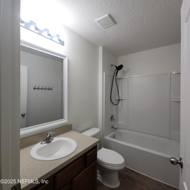 Building Photo - 15307 Bareback Dr