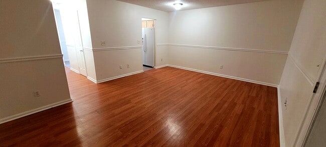 Building Photo - Spacious 3BR Townhome • $2,150 • Fenced Yard + Bonus Room • Prime Location