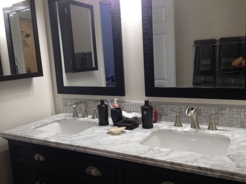 master bathroom vanity with marble countertop - 14572 Dickens St