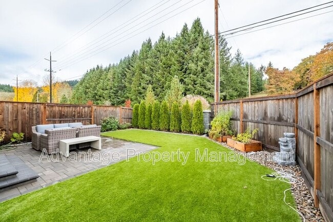 Building Photo - 5587 NW Torchcrest Pl