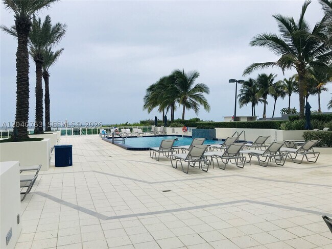 Building Photo - 6917 Collins Ave