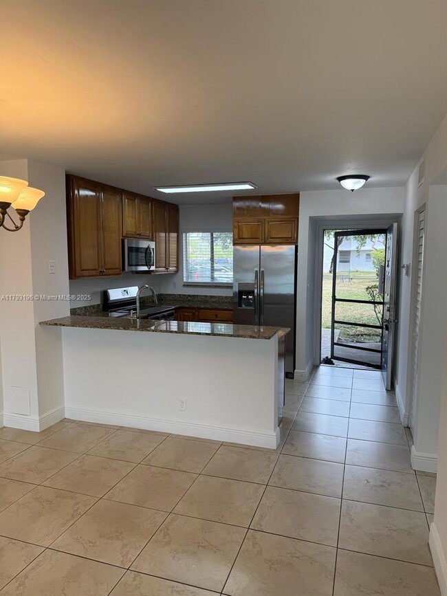 Building Photo - 8710 N Sherman Cir