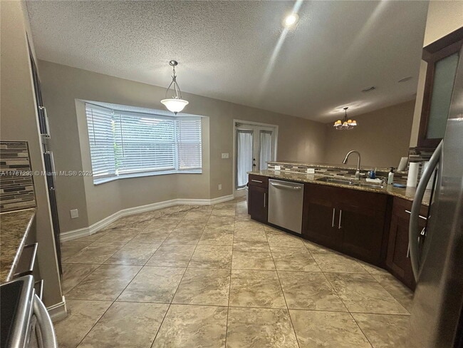 Building Photo - 9721 SW 15th Dr
