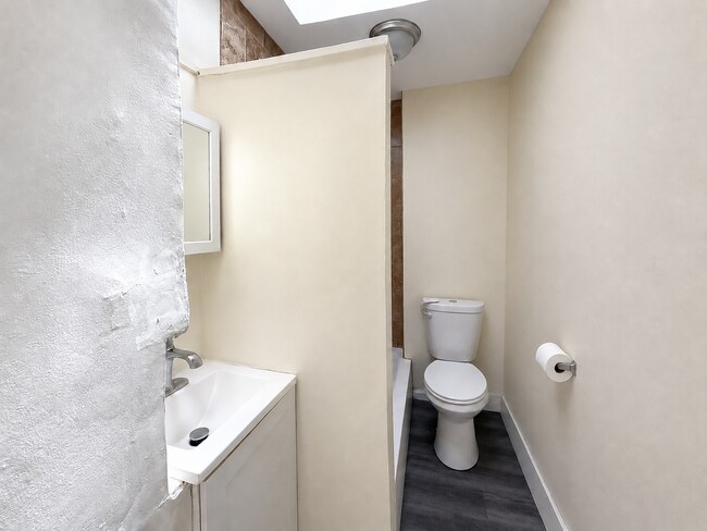 Building Photo - Charming Baltimore Rowhome with Updated Kitchen, Covered Front Porch & Basement