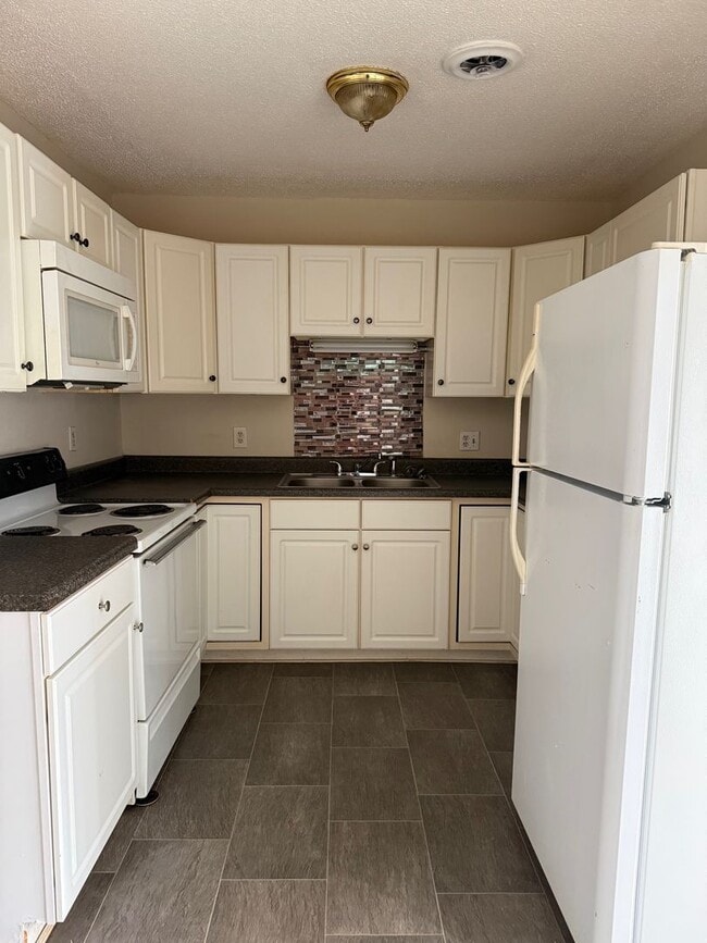 Building Photo - Serenity Village