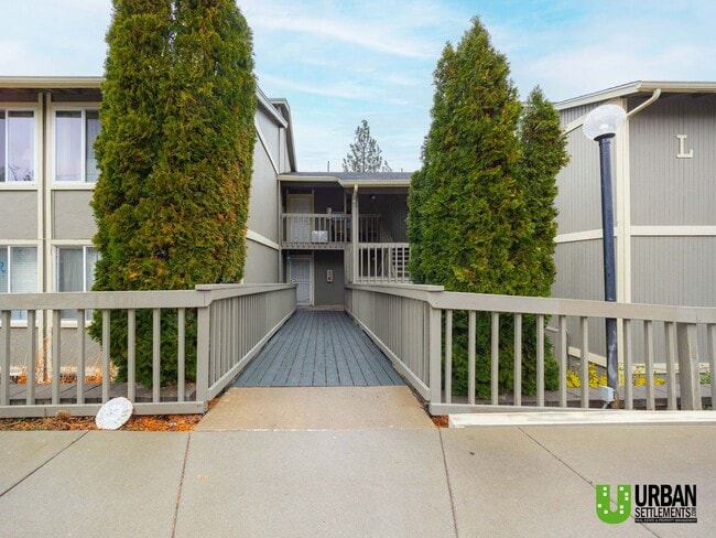 Building Photo - Comfortable 1-Bedroom Condo with Parking & Resort-Style Amenities