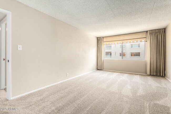 Building Photo - 7930 E Camelback Rd