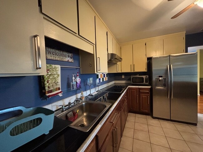 Building Photo - Beautiful Single-Story Townhome on Corner Lot with Private Courtyard & 2-Car Garage