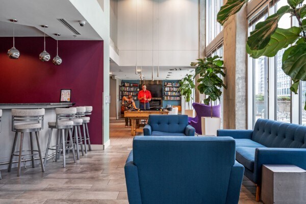 Visit the bar area with free coffee daily and have a seat and ready about today's events. - 301 Demonbreun St