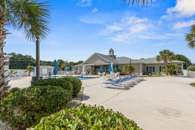 Building Photo - Modern 4BR Home with Screened Porch & Pond Views | Sun Colony, Longs SC