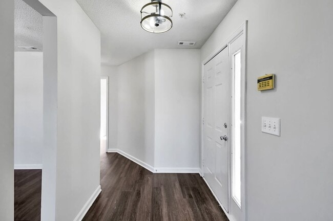 Building Photo - RENT SPECIAL! Freshly Painted! New Luxury ...