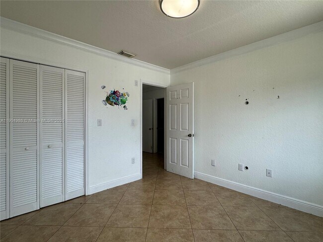 Building Photo - 2875 W 72nd Terrace