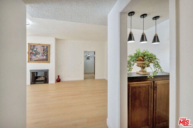 Building Photo - 1727 S Bentley Ave