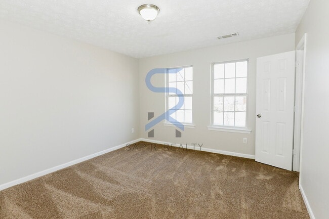 Building Photo - Modern All-Electric Comfort – 2BR/1.5BA at Wellington Chase Court