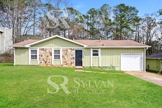 Building Photo - The living is easy in this 3 bedroom, 2 bathroom home