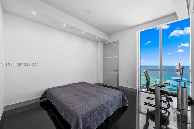 Building Photo - 18201 Collins Ave