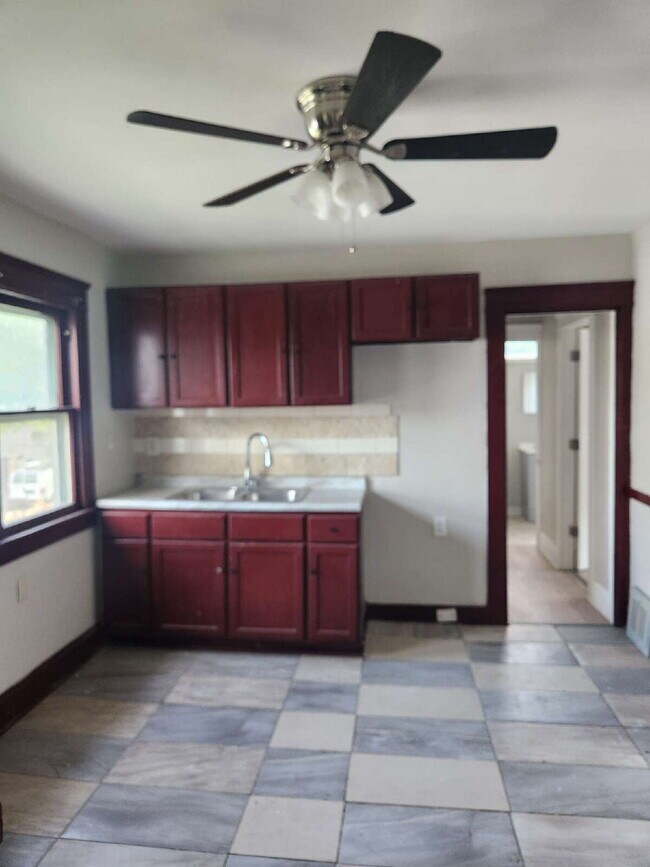 Building Photo - "Spacious 1.5 story 4-Bedroom Duplex on Ot...