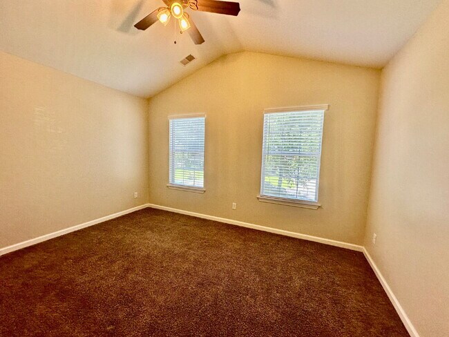 Building Photo - Four Bedroom Home with Private Fenced Back...