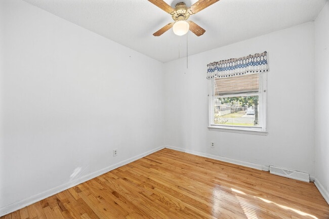 Building Photo - Classic Brick Ranch with 24x24 Workshop, Fenced Yard & Garden Beds