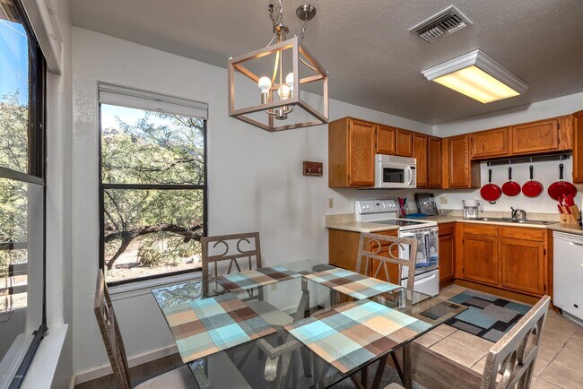 Building Photo - 6655 N Canyon Crest Dr