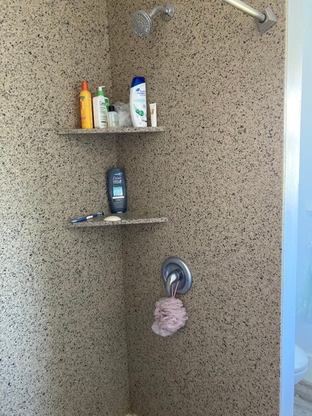 Granite Shower in front bathroom - 550 W 37th St
