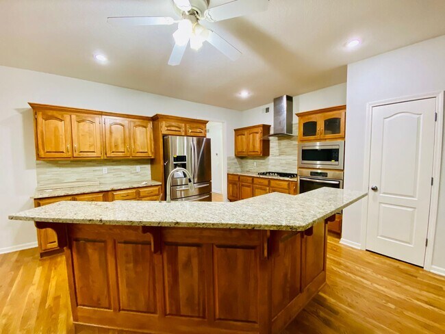 Building Photo - {15808} Hampton Place Two Story Home + Finished Basement + Three Car Garage + Blue Valley HS