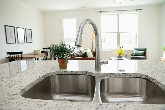 Building Photo - Brand New Construction Townhomes Await at ...