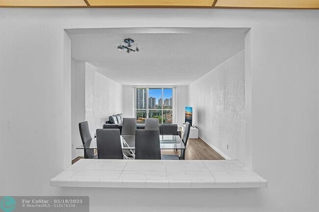 Building Photo - 19390 Collins Ave