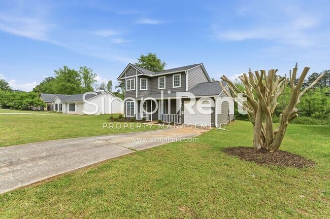 Building Photo - Updated Home with Spacious Layout & Private Backyard