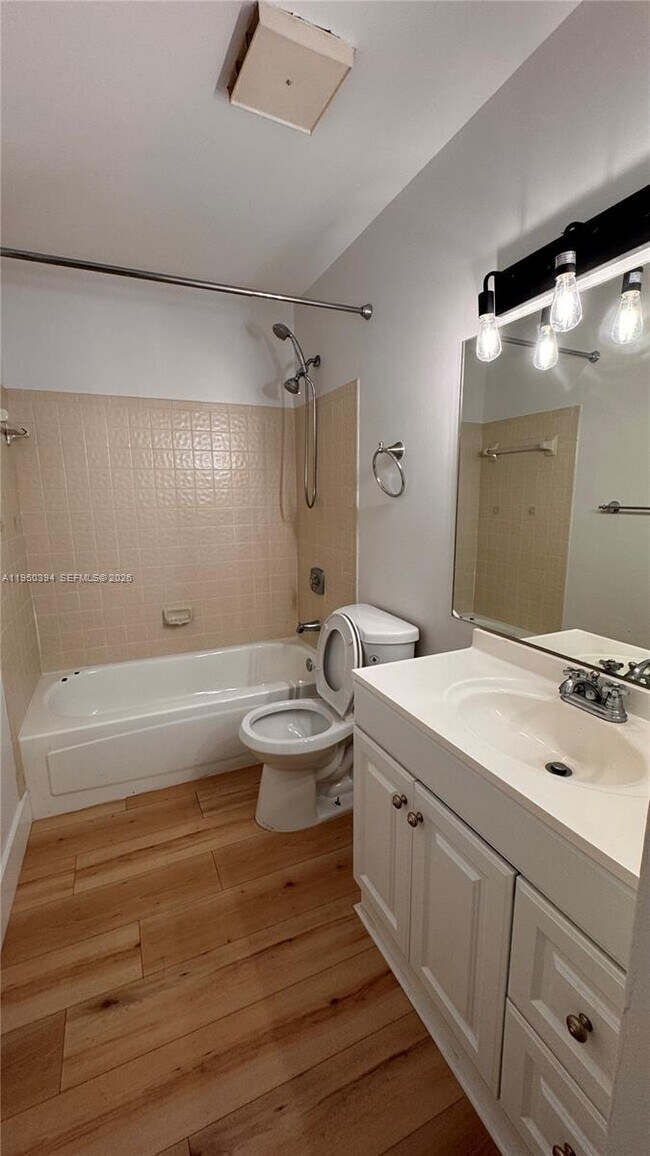 Building Photo - 3801 Cocoplum Cir