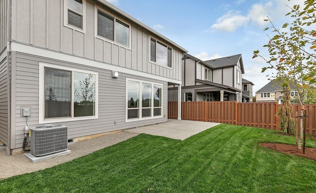 Building Photo - Bethany Stunner - 5 Bedrooms with Main-Level Bed & Bath, Modern Kitchen & Private Fenced Yard