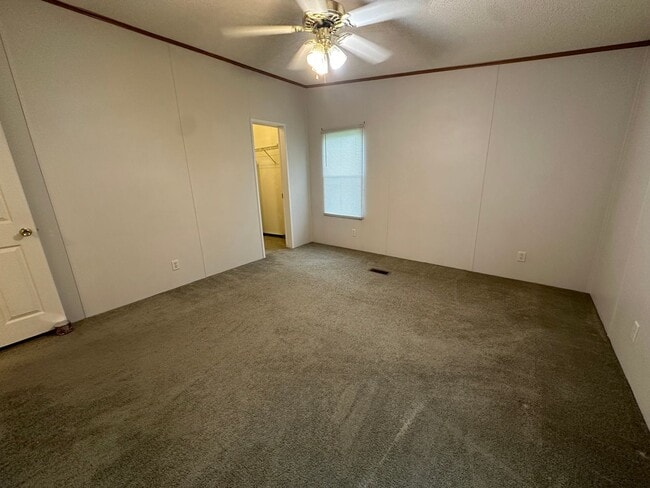 Building Photo - Charm & Commuter Convenience – 3BR/2BA Outside City Limits