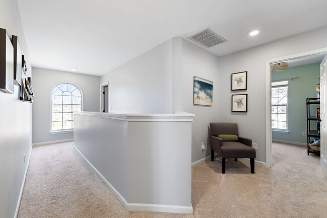 upstairs hall with arched window - 14040 Alley Son