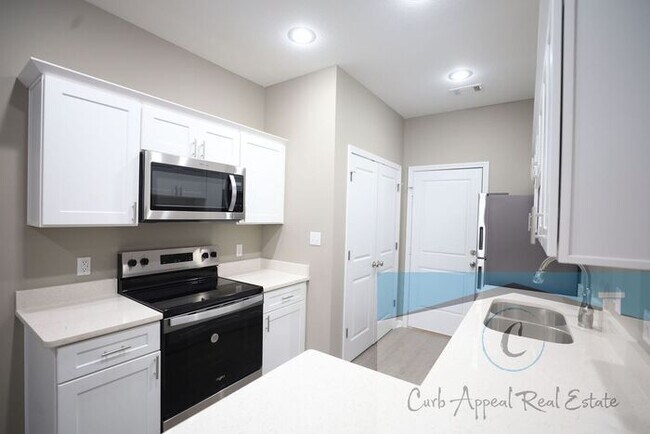 Building Photo - Luxury 2 bed 1 bath apartment - brand new construction!! Washer, dryer and utilities included!!