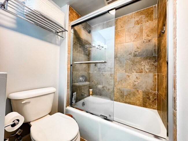 Building Photo - Fully Furnished Waikiki Condo with Direct Ocean Views, Parking, Central A/C