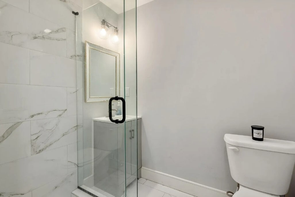 Full bath on 1st floor - 169 W 9th St