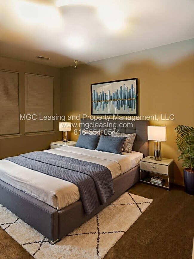 Building Photo - Enjoy Townhome Living w/a Finished Basemen...