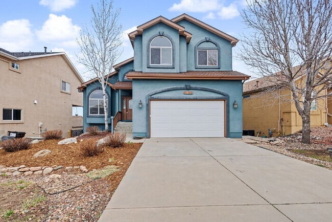 Building Photo - Spacious 5-Bedroom Home Backing to Open Space with Mountain Views