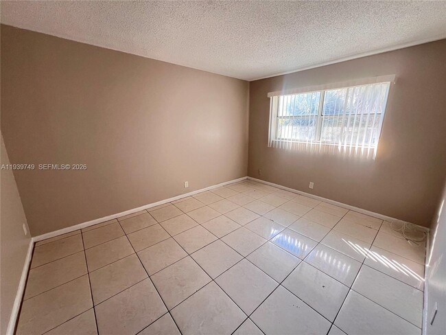 Building Photo - 1200 SW 50th Ave