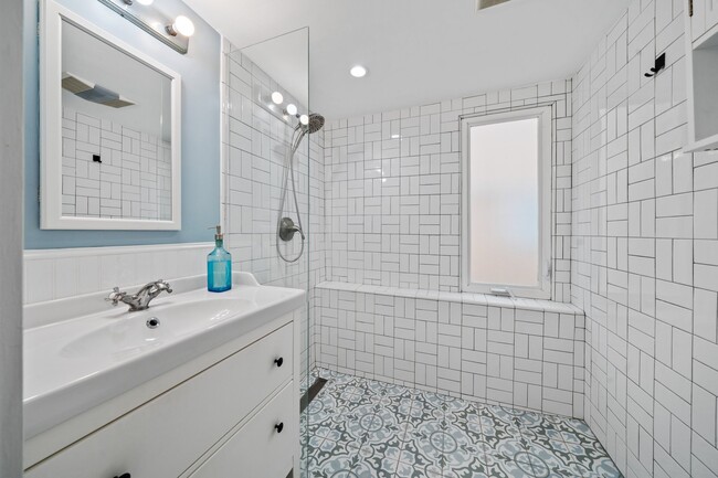 Master bathroom with curbless shower & natural light - 2118 3rd St